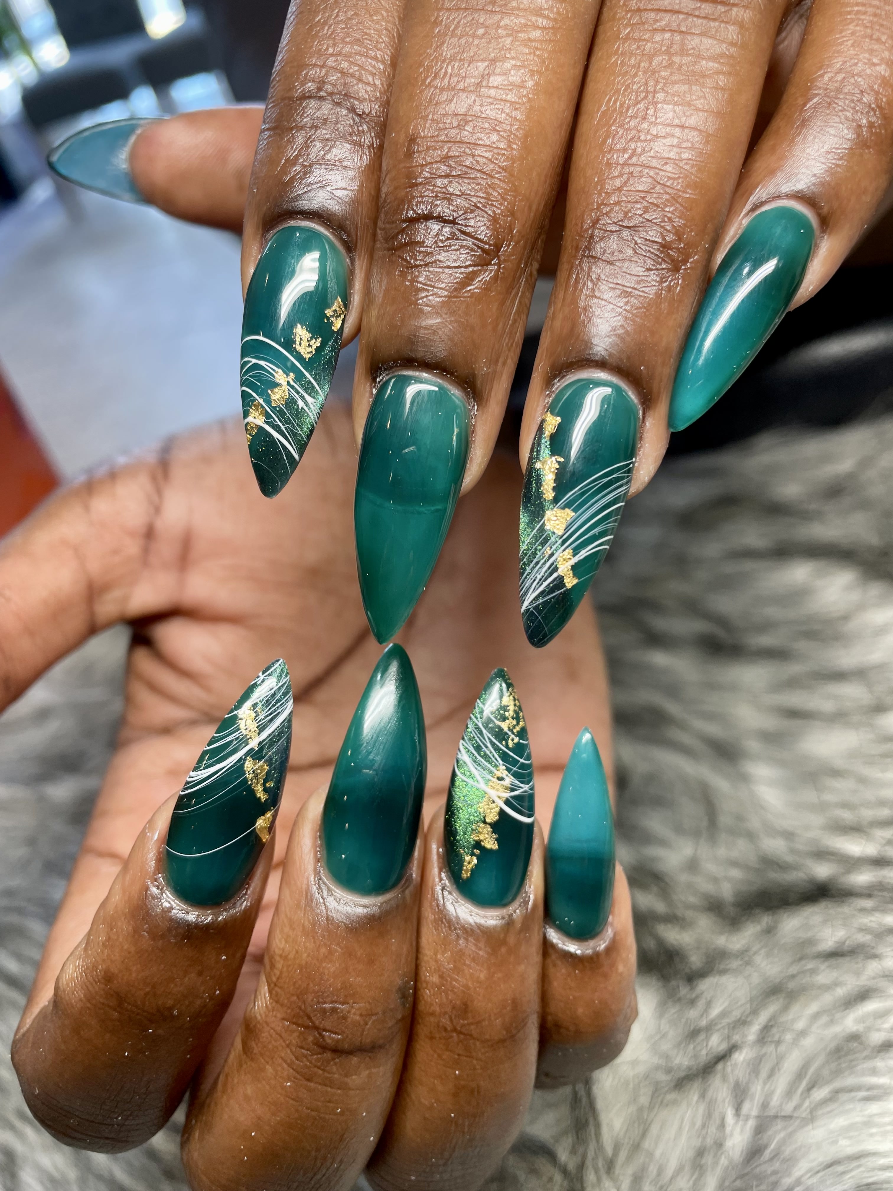 Emerald green cat-eye nails with gold foil — Glitz & Glam Jacksonville