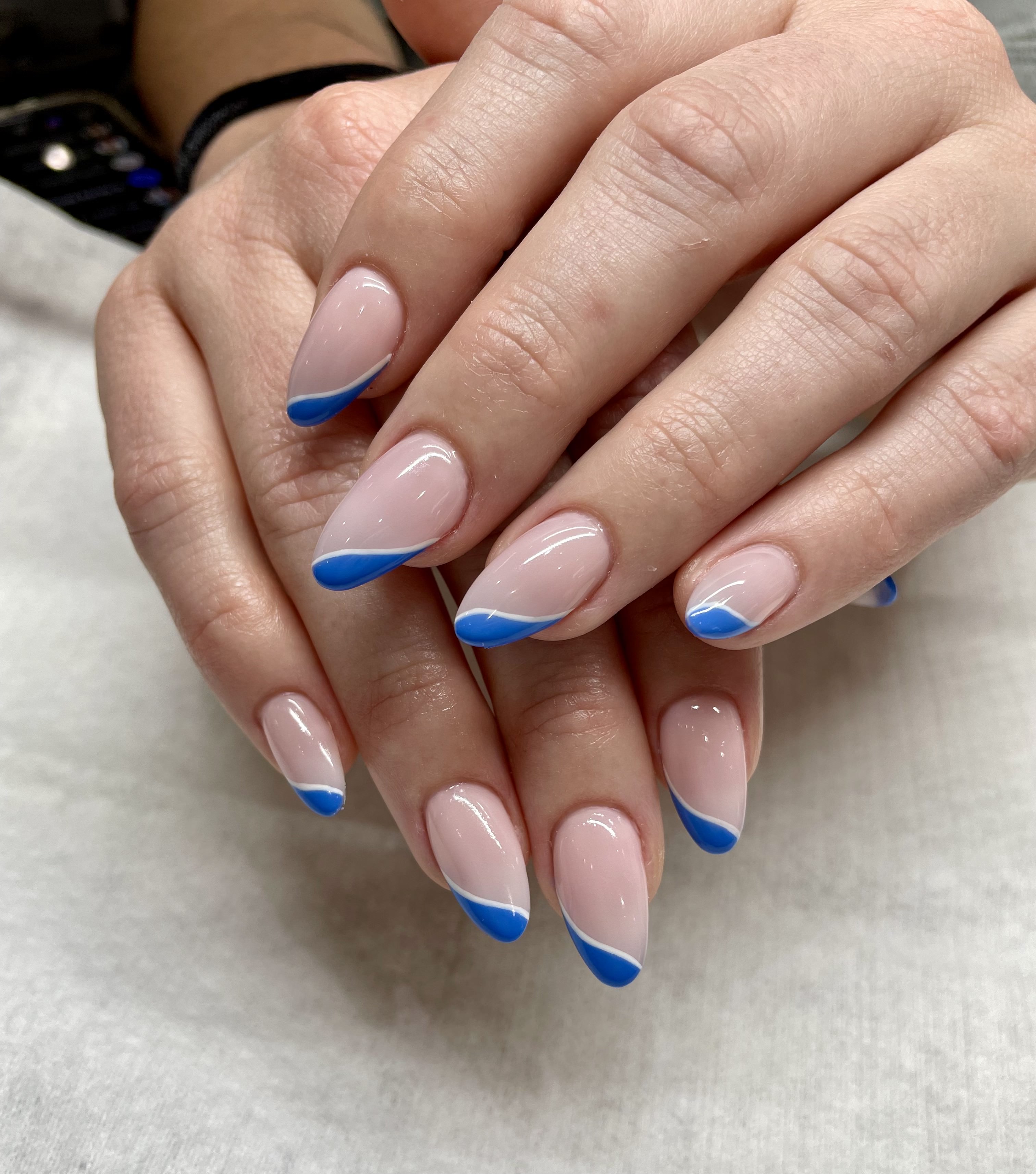 Blue French swirl nails — elegant and unique