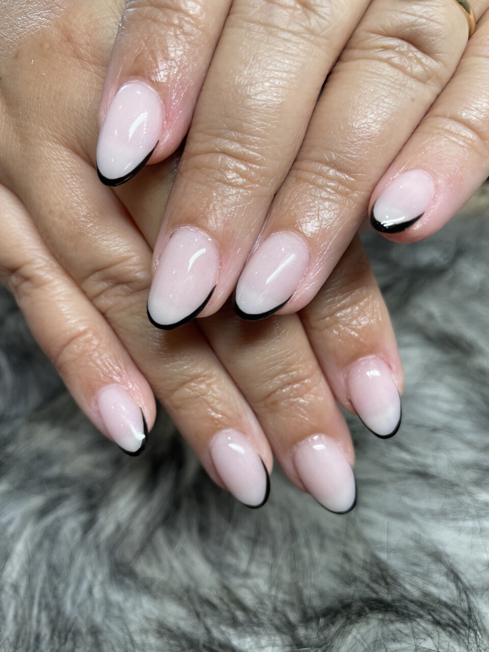 Classic black French tip nails — clean and sophisticated