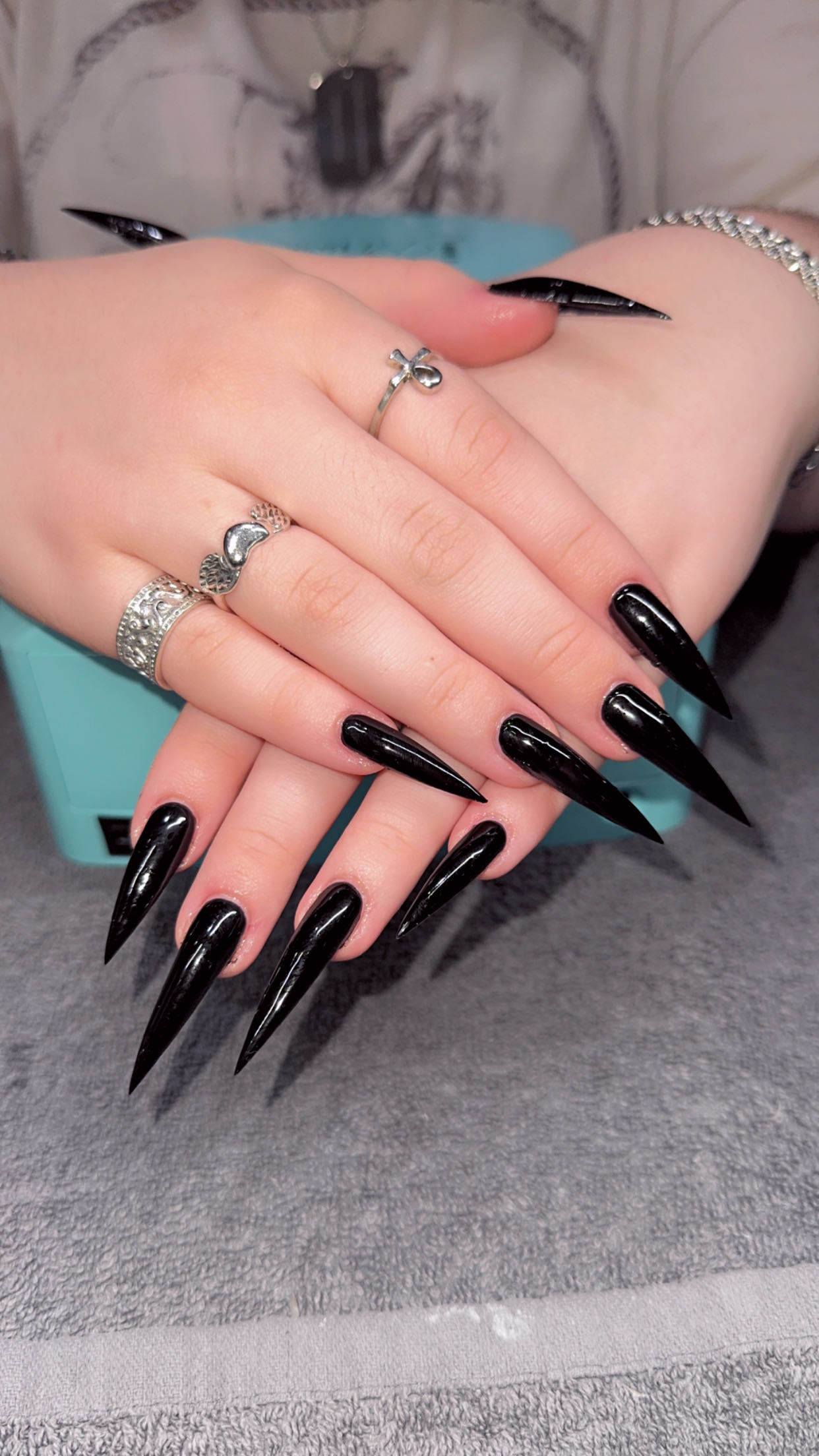 All-black stiletto nails — dramatic statement look