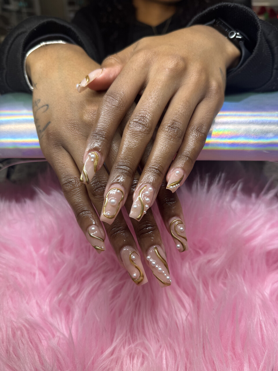 Nude coffin nails with gold swirls and pearl accents